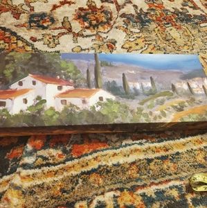 Red roof building canvas picture.